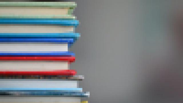 Photo of a stack of books.